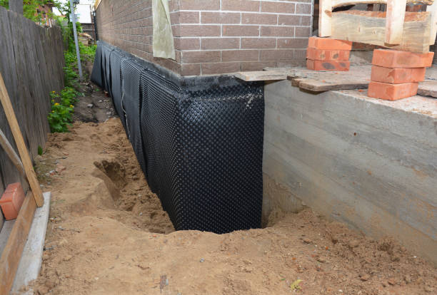 Happy homeowners after waterproofing job in Ottawa Lake